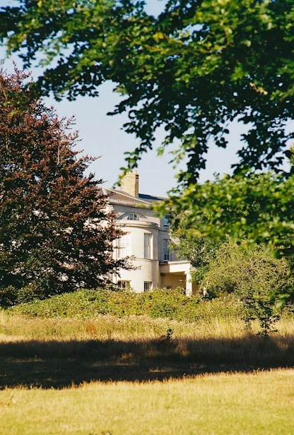 georgian-manor-house-meadow-field-view